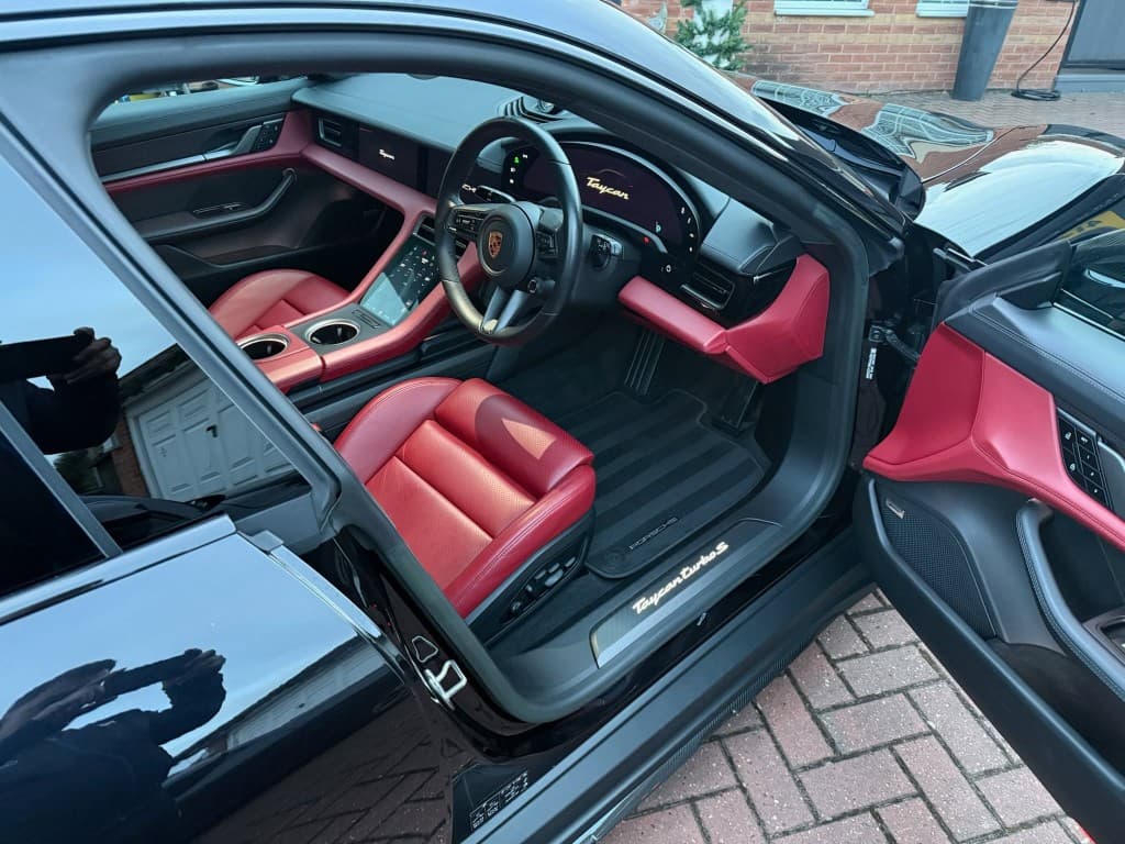 Porsche Taycan Turbo S interior — red leather deep cleaned and restored to showroom standard