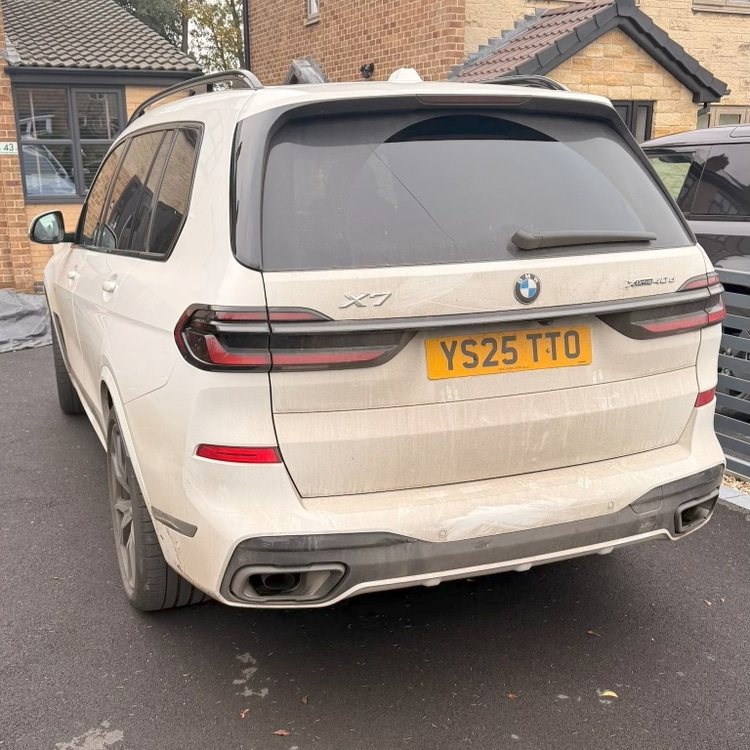 BMW X7 before — dusty cream bodywork with grime and dirty lower bumper