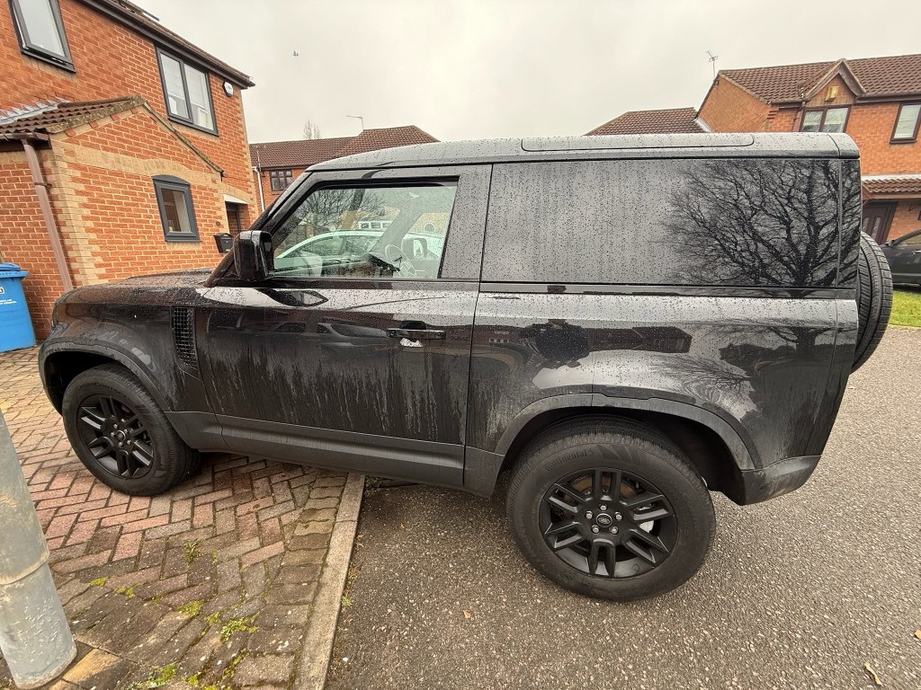 Land Rover Defender 90 before — dirty bodywork, water marks and grime across panels